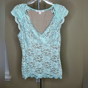 Never worn, sleeveless top, size large
